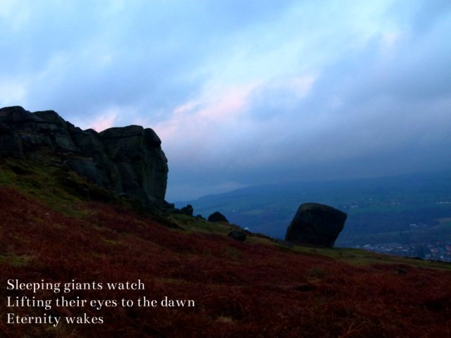 Sleeping giants watch, lifting eyes to the dawn, eternity wakes