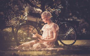 girl reading &amp; bike