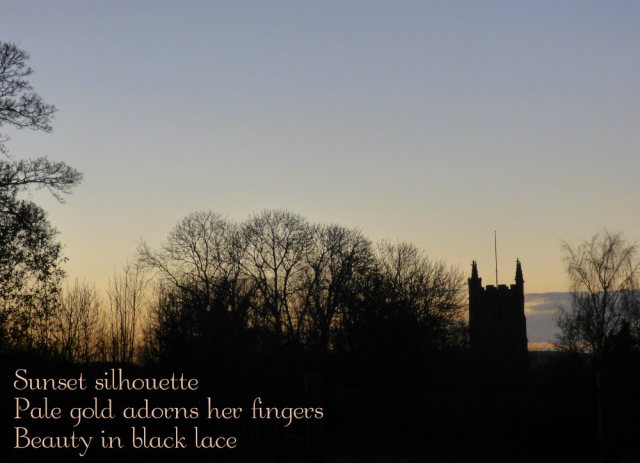 Sunset silhouette Pale gold adorns her fingers Beauty in black lace